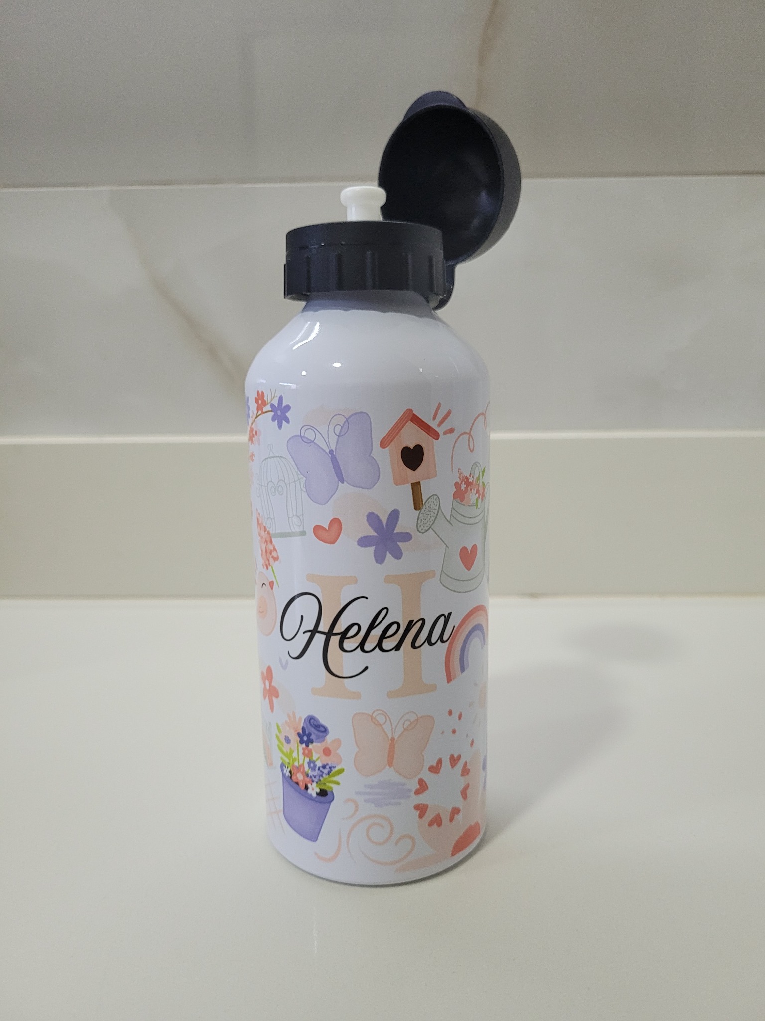 Squeeze infantil Helena com flores, borboletas e elementos delicados